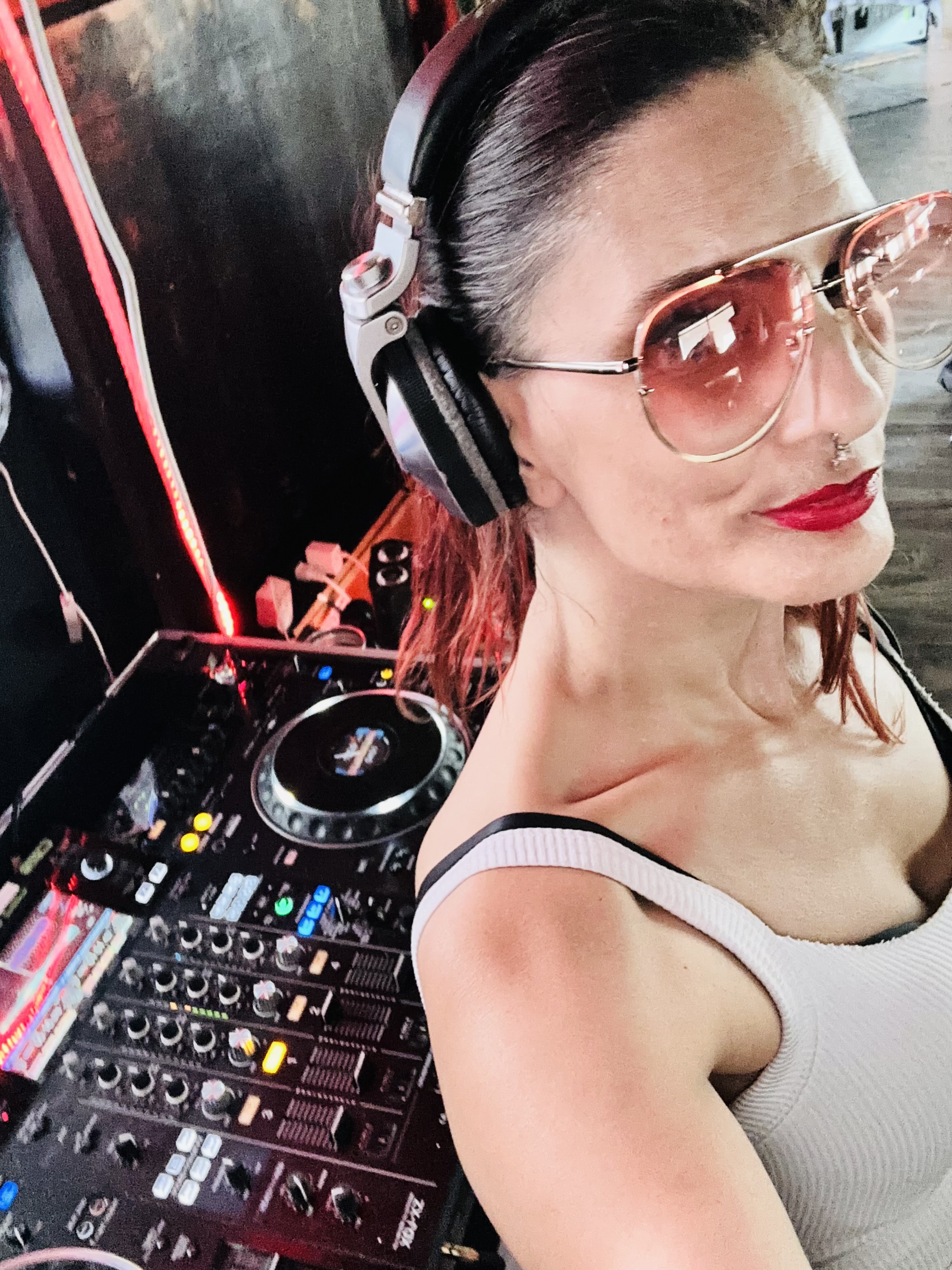 DJ Shiva Tiffany portrait with neon styling